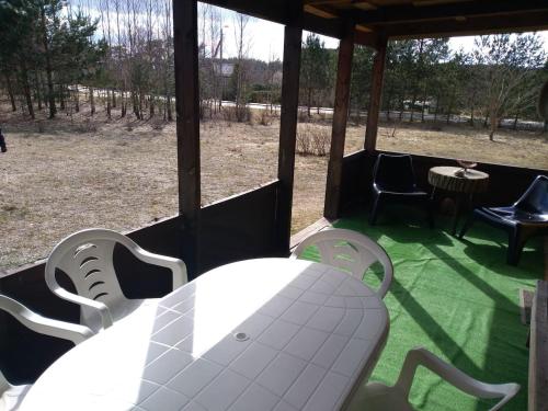 Balkons/terase, Paupio namelis prie Vorutos / Riverside cabin in Anyksciai