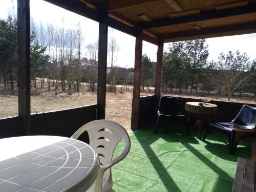 Balkons/terase, Paupio namelis prie Vorutos / Riverside cabin in Anyksciai