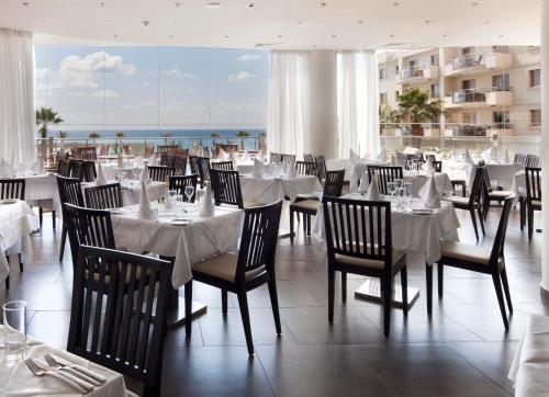 Restaurant, Capital Coast Resort And Spa in Paphos