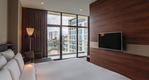 Junior King Suite with Sofa Bed and City View