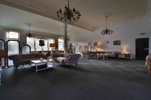 sala de TV, Hotel Rummeni in Borkum