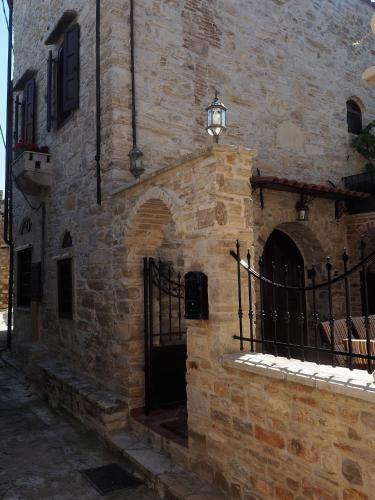 Entrance, Traditional Tower in the center of kalamoti in Agia Trias