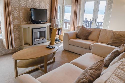 Koplietošanas atpūtas telpa ar TV, Bonnie Banks Lodge Ardlui in Ardlui
