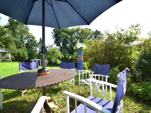 Balcony/terrace, Cosy holiday home with gazebo on the edge of the forest in Weissenburg in Bayern