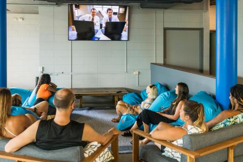 gedeelde lounge/tv-ruimte, Summer House Backpackers Cairns in Cairns