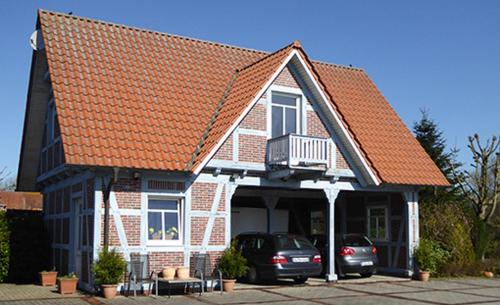 Casa Carina Ferienhaus, Oberwohnung mit kleinem Sonnenbalkon und Terrasse