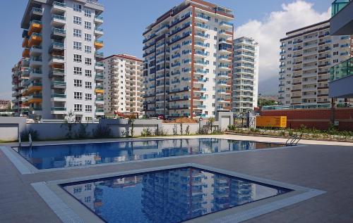  Квартира 1 +1 в комплексе класса Люкс, Pension in Alanya bei Alanya