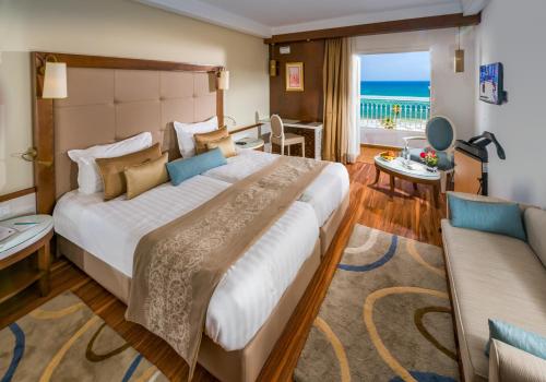 Chambre avec 2 lits, vue sur la mer, balcon