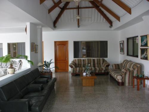 Közös társalgó / TV, Hotel Villa Ricaurte in Ricaurte