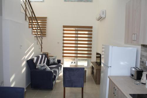 Koplietošanas atpūtas telpa ar TV, Suluca Homes in Ozankoy