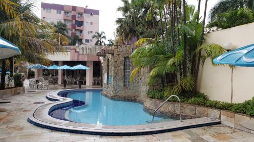 Swimming pool, Apartamento Caldas in Popular