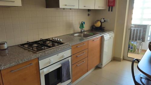 ห้องครัว, Sunshine Apartment in กอนเซเซา