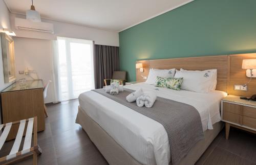 Palm Beach Hotel - Adults only Located in Psalidi, Palm Beach Hotel - Adults only is a perfect starting point from which to explore Kos Island. The property offers a wide range of amenities and perks to ensure you have a great time