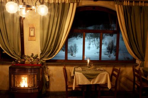 Restaurant, Chalet Sul Lago Hotel In Montagna in Moncenisio