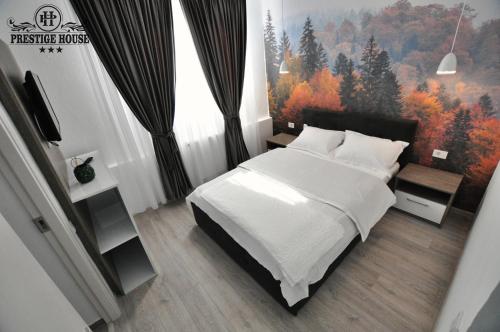 Pensiunea Prestige House in 阿爾傑什河畔庫爾泰亞