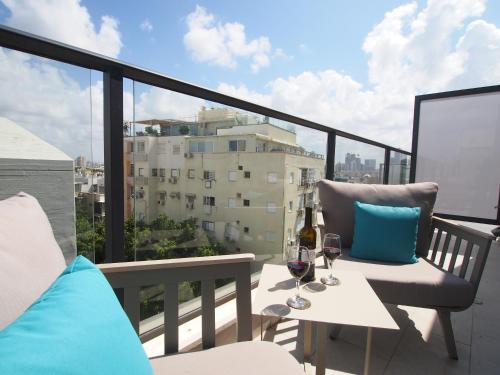 Junior Suite with Balcony room in The Roof - By Sea Land Suites