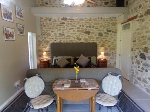 Chambre d’hôte - Ilse's Garden Chair chambre d'hôte Saint-Germain-les-Belles