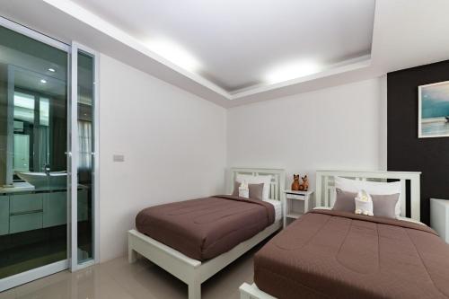 Baanpoon Apartment Room Type - Deluxe Twin Room