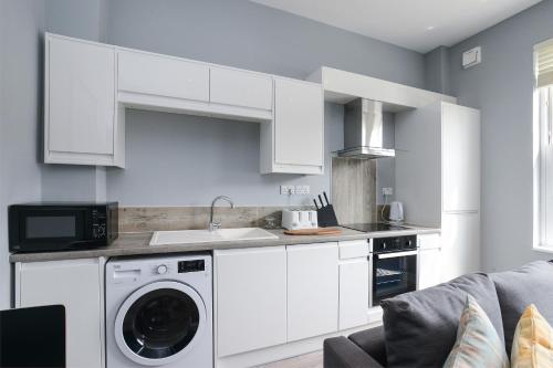 Arena Apartments - Stylish and Homely Apartments by the Ice Arena with Parking