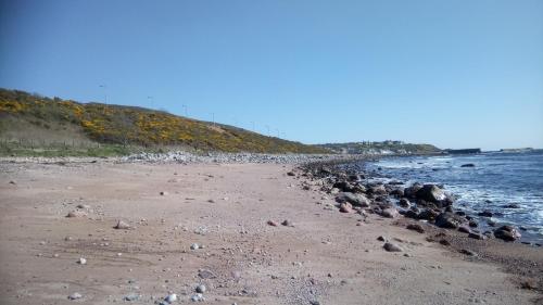 Beach, Piper's Cave in Helmsdale