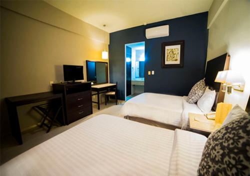 Hotel Grand Marlon Hotel Grand Marlon is conveniently located in the popular Chetumal area. Offering a variety of facilities and services, the hotel provides all you need for a good nights sleep. Take advantage of the 