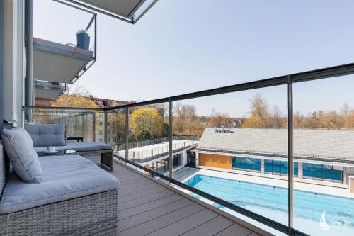 Feniks SPA Apartaments 12 by Jantar Apartamenty Kołobrzeg (Feniks SPA Apartaments 12 by Jantar Apartamenty Kolobrzeg) in ปอดตเชเลอ