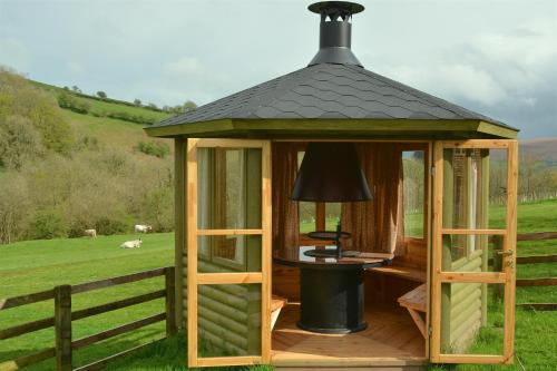 Snug Oak Hut with a view on a Welsh Hill Farm