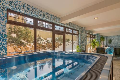 Pezsgőfürdő, Rizzo Boutique Hotel in Poiana Brasov