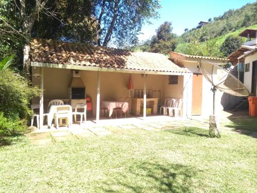 Casa dois andares com área de churrasco em Ibitipoca