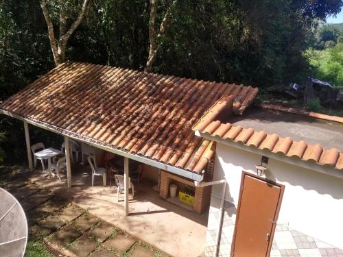 Casa dois andares com área de churrasco em Ibitipoca