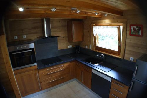 CHALET INDEPENDANT AVEC JACUZZI PRIVATIF gîte à louer Docelles