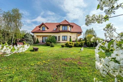 Hotelli välisilme, RYSIÓWKA pokoje gościnne (RYSIOWKA pokoje goscinne) in Modlniczka