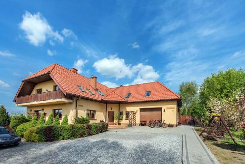 RYSIÓWKA pokoje gościnne (RYSIOWKA pokoje goscinne) in Modlniczka