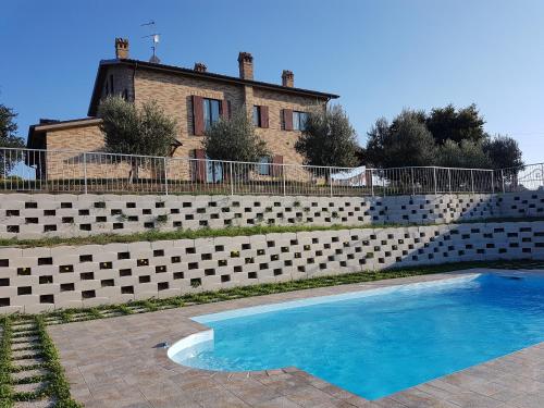 Swimming pool, Agriturismo bio Verde Armonia in Montemarciano