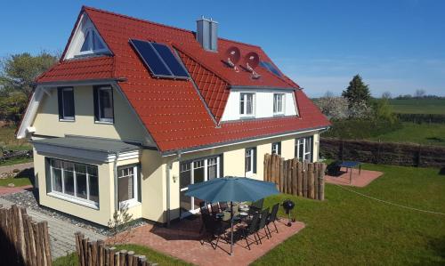 Ferienhäuser Hühnergott und Kranichnest, Sauna, Kamin und Garten