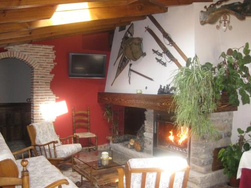 ห้องส่วนกลางสำหรับนั่งเล่น/ดูทีวี, Hotel Rural Los Frutales in เลกาเนส