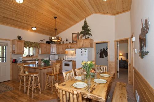 Wagon Wheel by KABINO Fire Pit Bunks Satellite Big Driveway WiFi Grill in Island Park, USA
