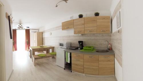 кухня, Orchidea apartman in Харкань