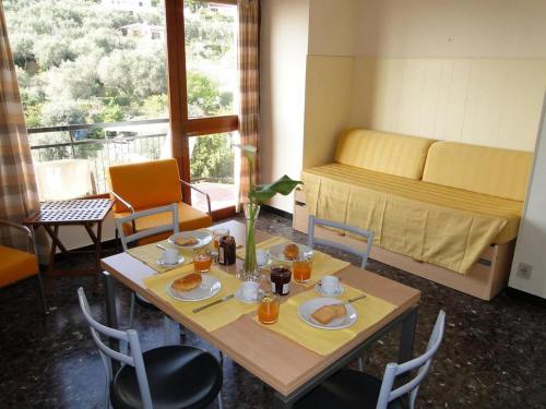 One-Bedroom Apartment with Balcony and Sea View