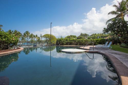 78-6721 ALii Dr Condo Unit 1-203 - main image