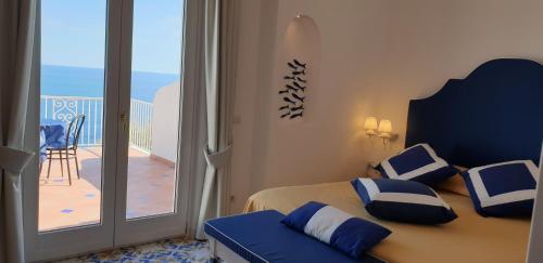 Superior Triple Room with Balcony and Sea View