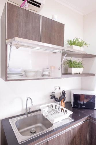 Kitchen, Rumah Kamang Residence near Ragunan Zoo