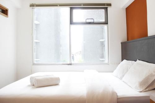 Strategic 1BR Apartment with Sofa Bed at The Jarrdin Cihampelas By Travelio, Cimahi