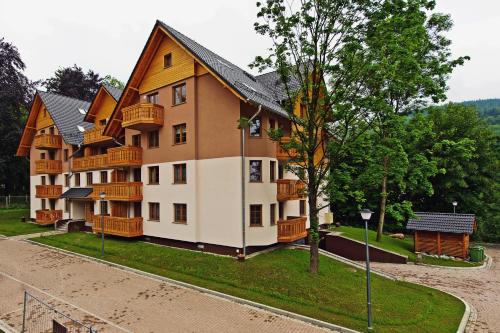 Apartamenty Sun & Snow Leśny Dom - image 7