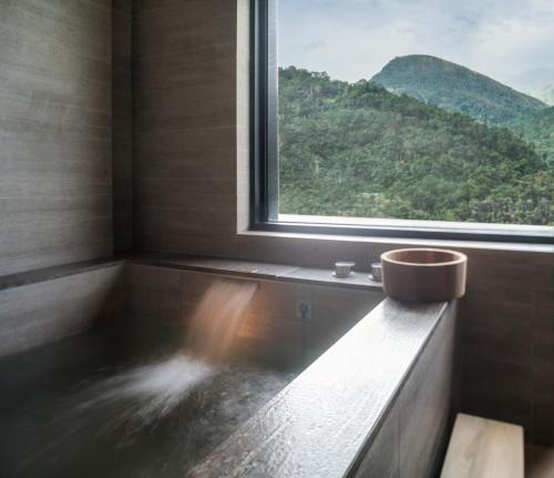 Phòng tắm, Mu Jiao Xi Hotel in Nghi Lan