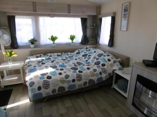 Chalet Joleen IJmuiden aan zee, vlakbij het strand in 艾默伊登