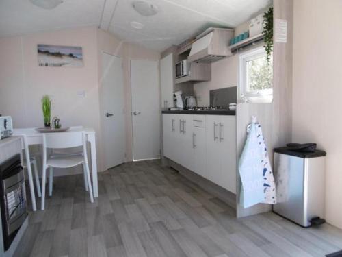 Chalet Joleen IJmuiden aan zee, vlakbij het strand in 艾默伊登