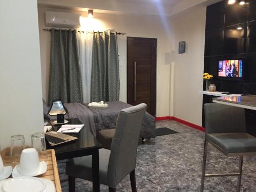 Shared lounge/TV area, Mirasol Residences in Daet