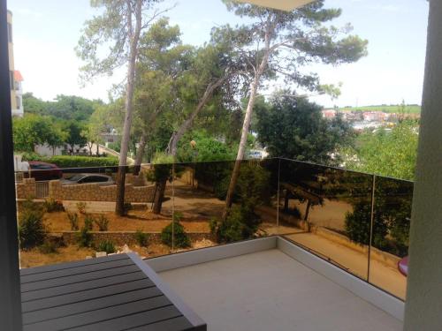  New modern apartment with sea view-150m from beach in Petrčane