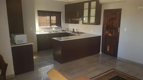 주방, Sunflower Guesthouse in 밴더바일 파크